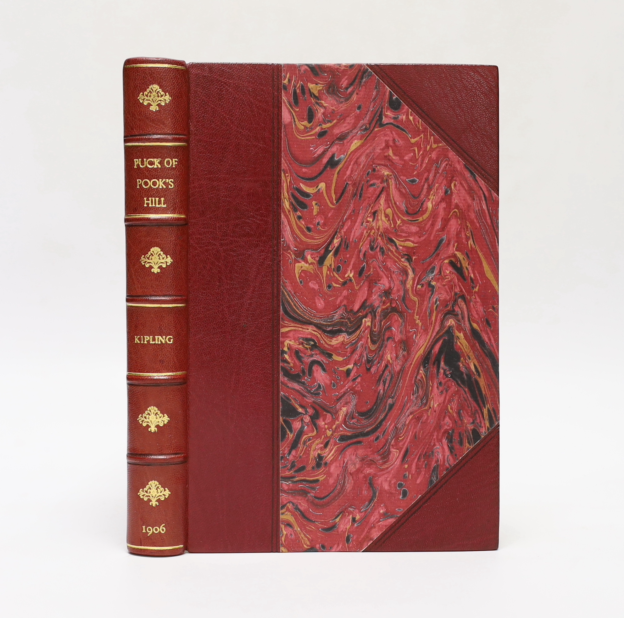 Kipling, Rudyard - Puck of Pook's Hill. First edition, 20 full page illus. (by H.R. Millar), half title and 5 advert. leaves; sometime rebound red half morocco and marbled boards, gilt decorated, ruled and lettered panel